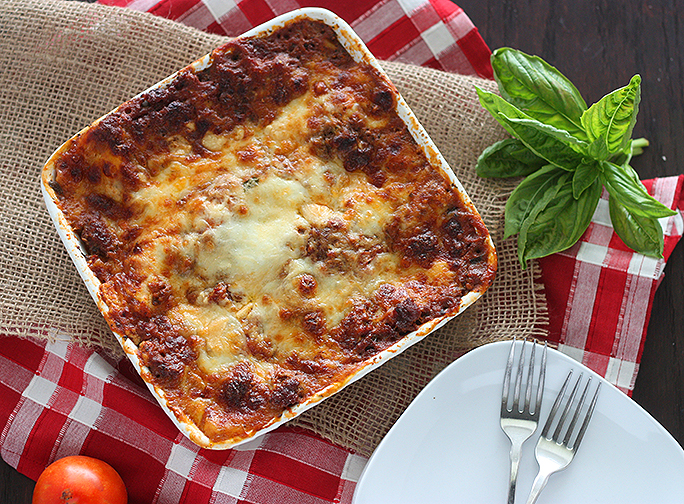 By far the best lasagna you'll ever have -- packed full of rich, meaty, slowly simmered tomato sauce and melty mozzarella cheese.