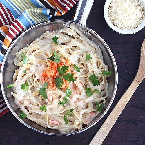 Succulent crawfish tails are tossed with creamy alfredo sauce and tender fettuccine noodles in this recipe for crawfish fettuccine alfredo.