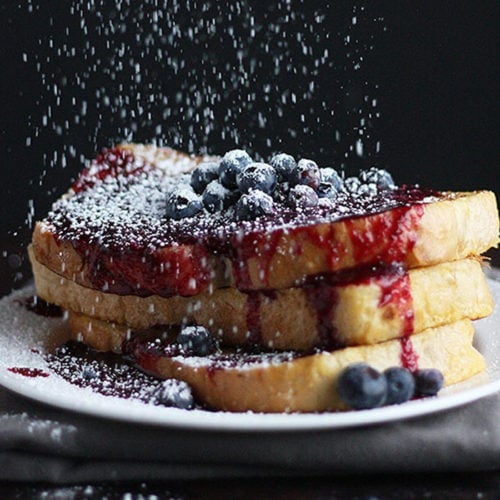 French toast covered with Strawberry Blueberry Sauce and powdered sugar