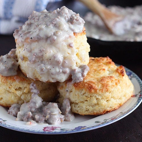 Learn how to make sausage gravy and biscuits in minutes. Simple and easy to prepare, this creamy gravy is a staple in the South.