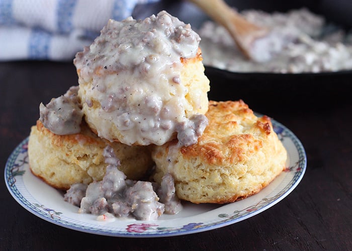 Learn how to make sausage gravy and biscuits in minutes. Simple and easy to prepare, this creamy gravy is a staple in the South.