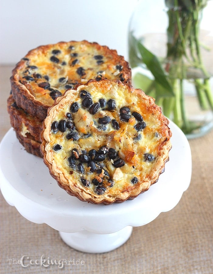 Looking for more hearty quiche fillings? Shredded chicken breast, black beans, and smoked cheddar make this a little more robust than your average quiche.