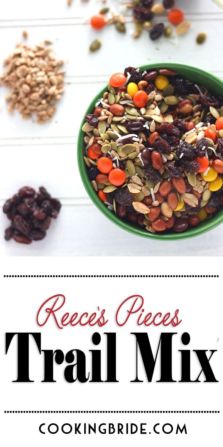 This easy-to-make Reece's trail mix recipe contains roasted, shelled pumpkin seeds, sunflower seeds, raisins, coconut, peanuts, and Reese's pieces.