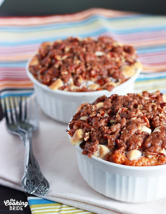 sweet potato casserole with pecans in white ramekins