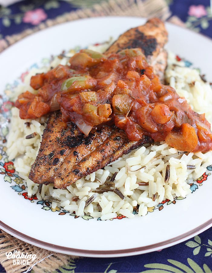 This simple and delicious Creole inspired blackened catfish recipe is seasoned with homemade spice rub then topped with a savory tomato sauce.