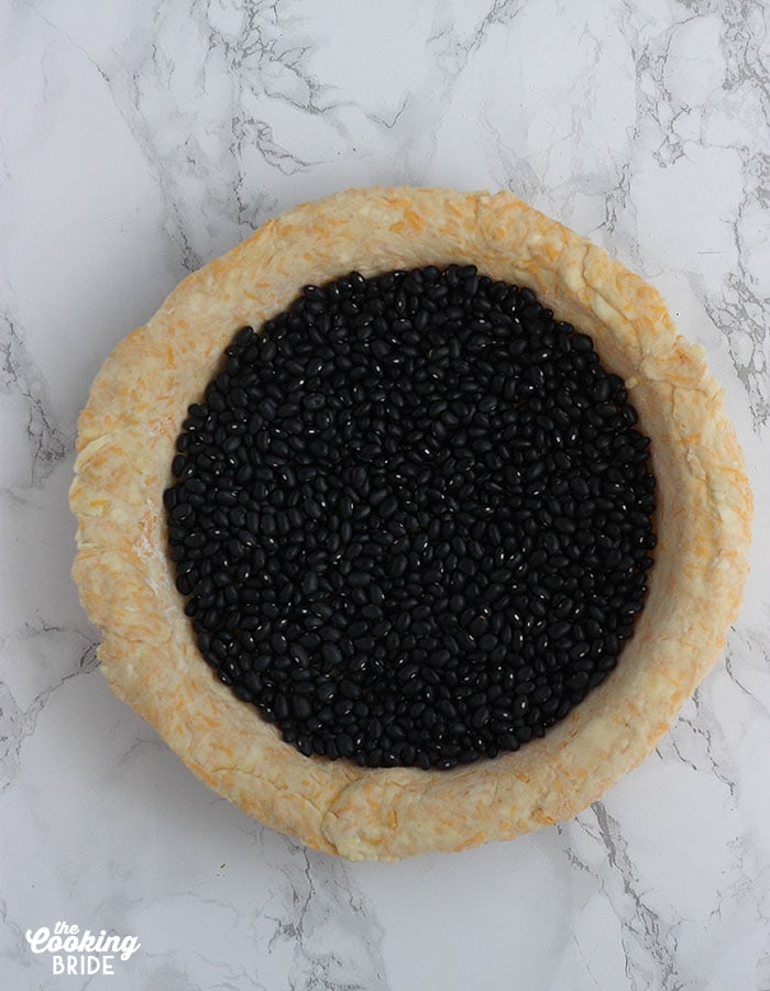 pie crust weighted with dried beans