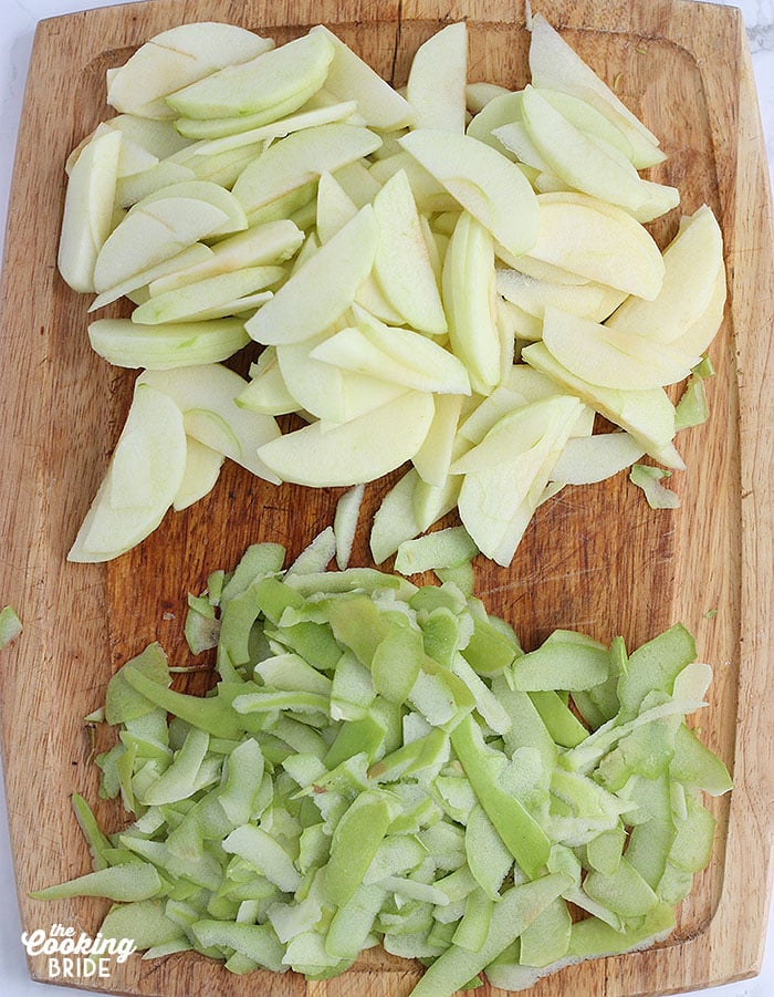 sliced Granny Smith apples on a cutting board