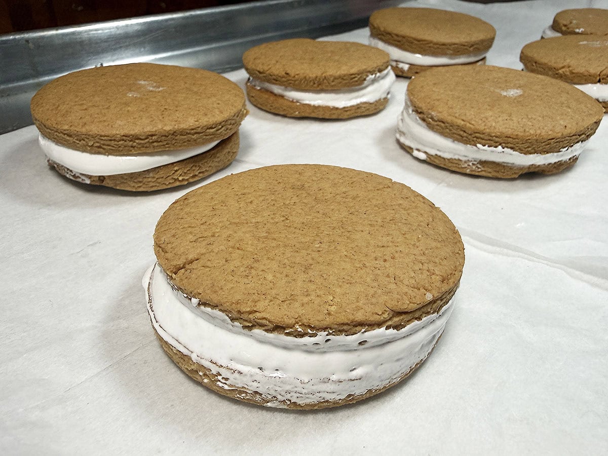 Moon pies filled with marshmallow creme and topped with a cookie.
