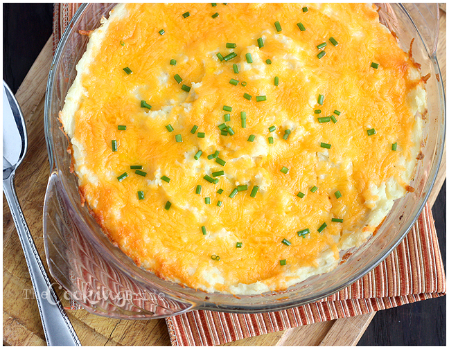 Easy recipe for homemade mashed potato casserole is cheesy, delicious, only contains five ingredients, and is freezer friendly.