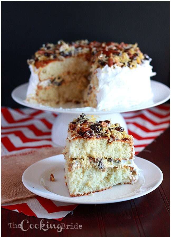 A forgotten Southern classic, Amalgamation cake is filled with raisins and coconut, iced with homemade frosting and garnished with more coconut and raisins.