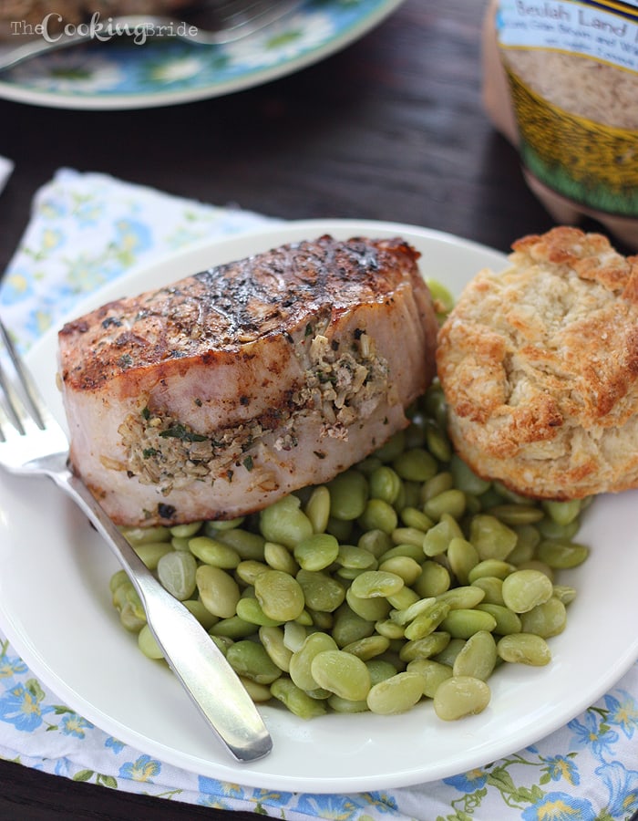 Thick grilled boneless pork loin chops are stuffed with a creamy brown rice mixture seasoned with homemade fresh herb pesto.