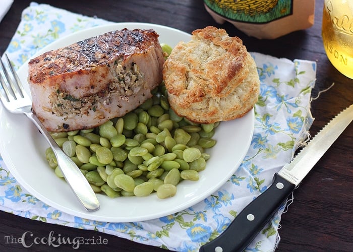 Thick grilled boneless pork loin chops are stuffed with a creamy brown rice mixture seasoned with homemade fresh herb pesto.