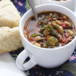 Pot likker, the flavorful liquid leftover after cooking down a pot of greens, is the base of this hearty soup. It's also chock full of tender beans and veggies.