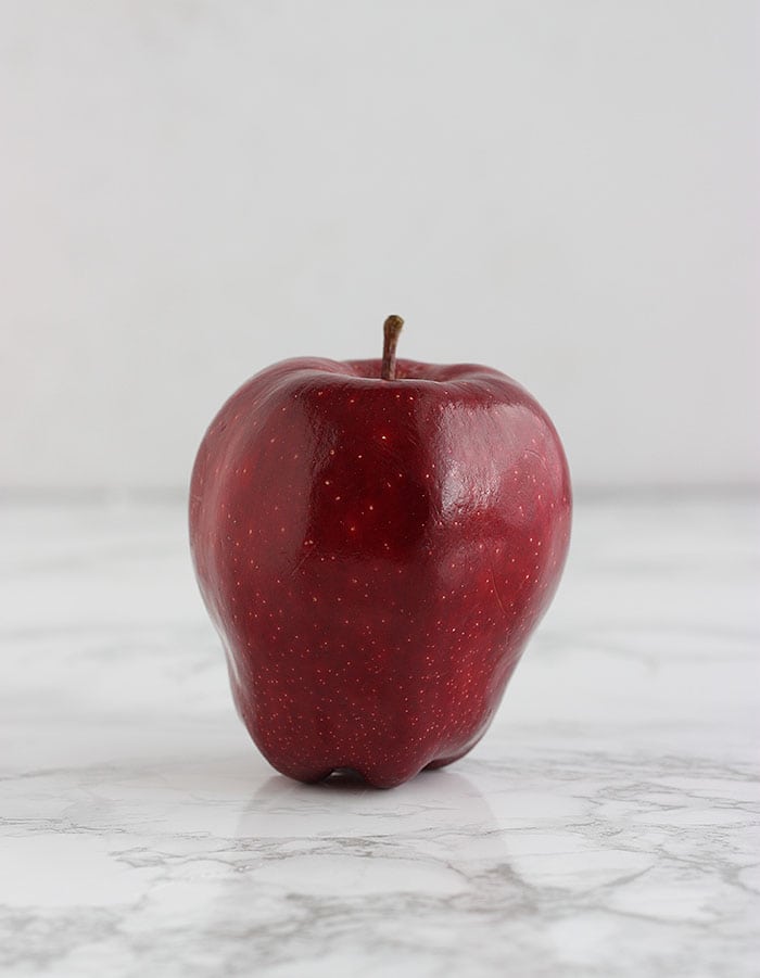 red delicious apple on a white background