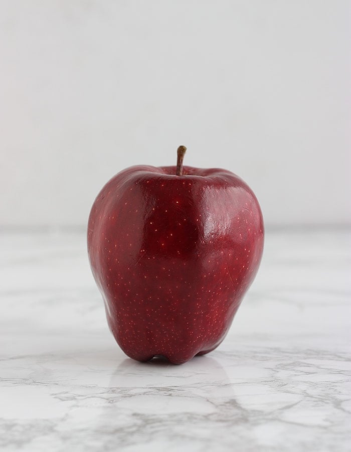 red delicious apple on a white background