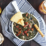 Learn how to cook turnip greens just like they do in the South. Greens are slowly simmered with pork jowl, apple cider vinegar, salt and pepper for a tender, tasty soul food side dish.