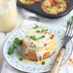 oven baked egg on a biscuit drizzled with Hollandaise