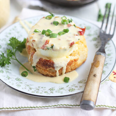 oven baked egg on a biscuit drizzled with Hollandaise