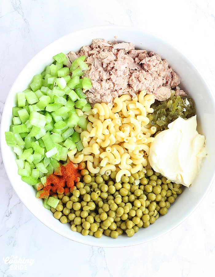 salad ingredients before they are mixed in a large mixing bowl