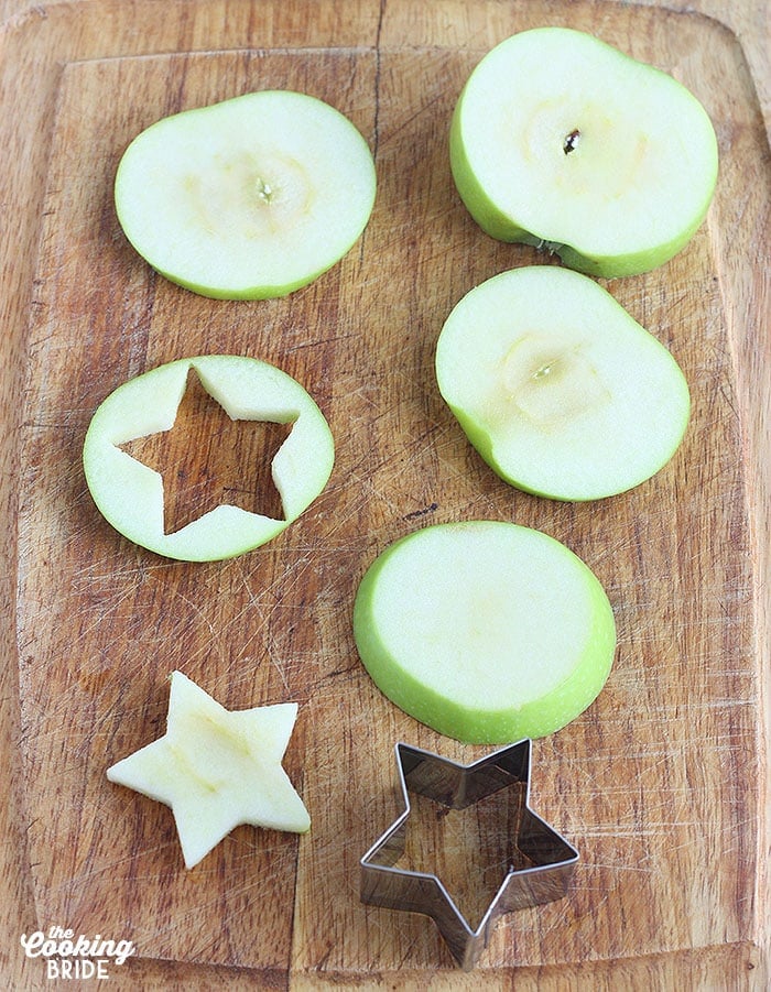 cutting star shapes out of apple rounds