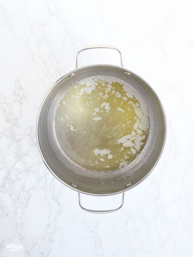 melted butter in a stainless steel stock pot