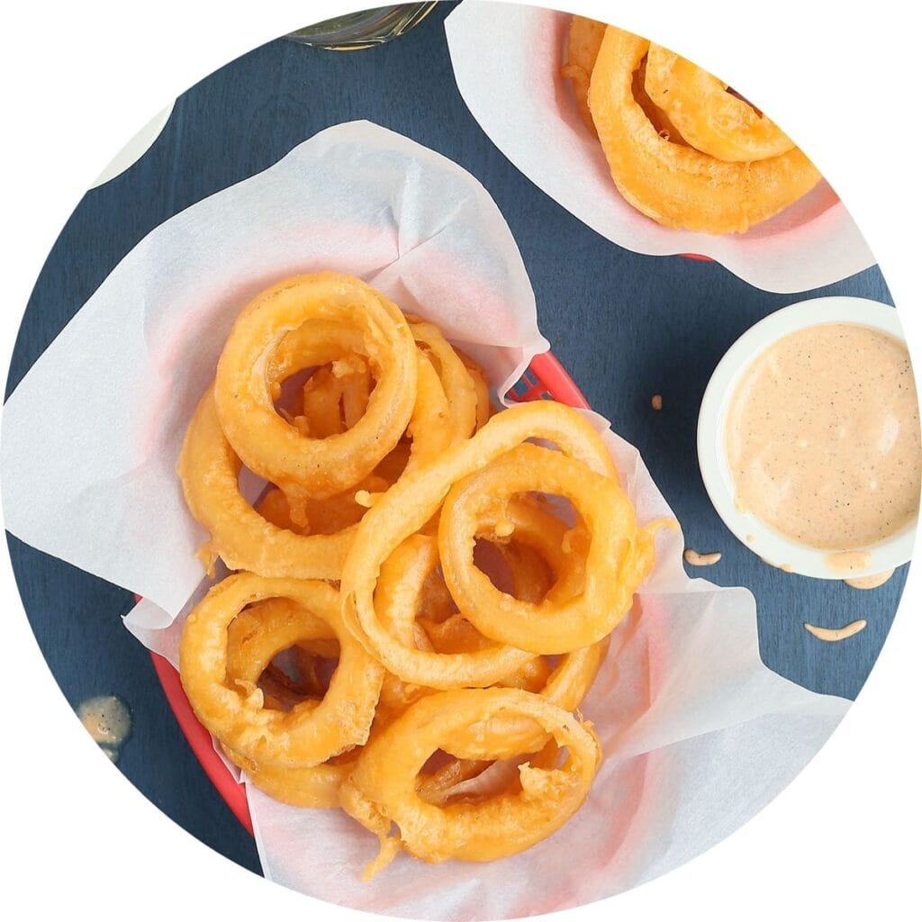 fried onion rings in a basket