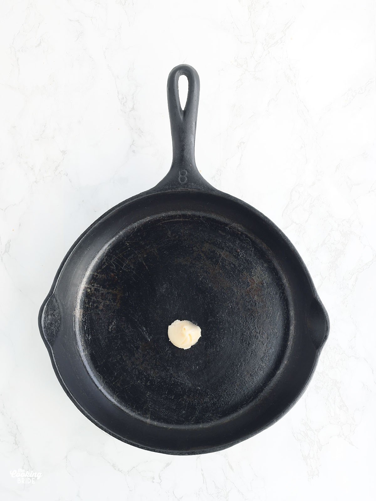 one tablespoon of bacon grease in a cast iron skillet