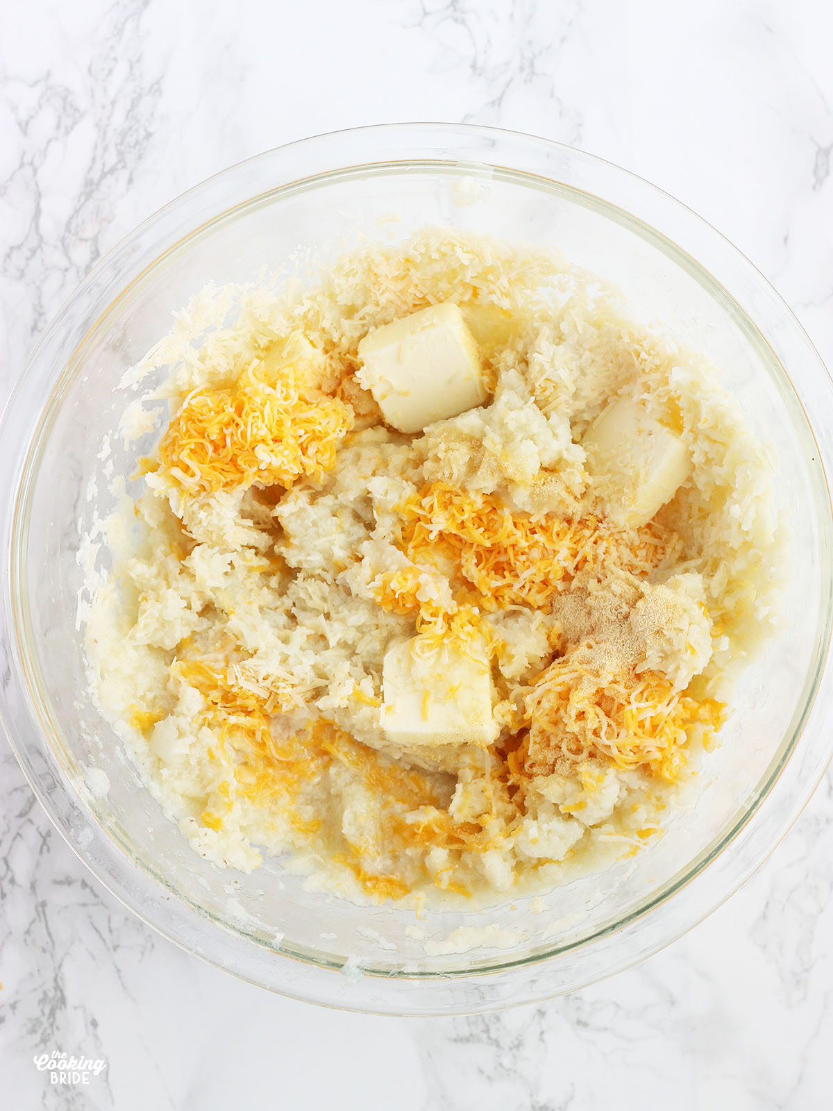 pureed cauliflower with butter and shredded cheese