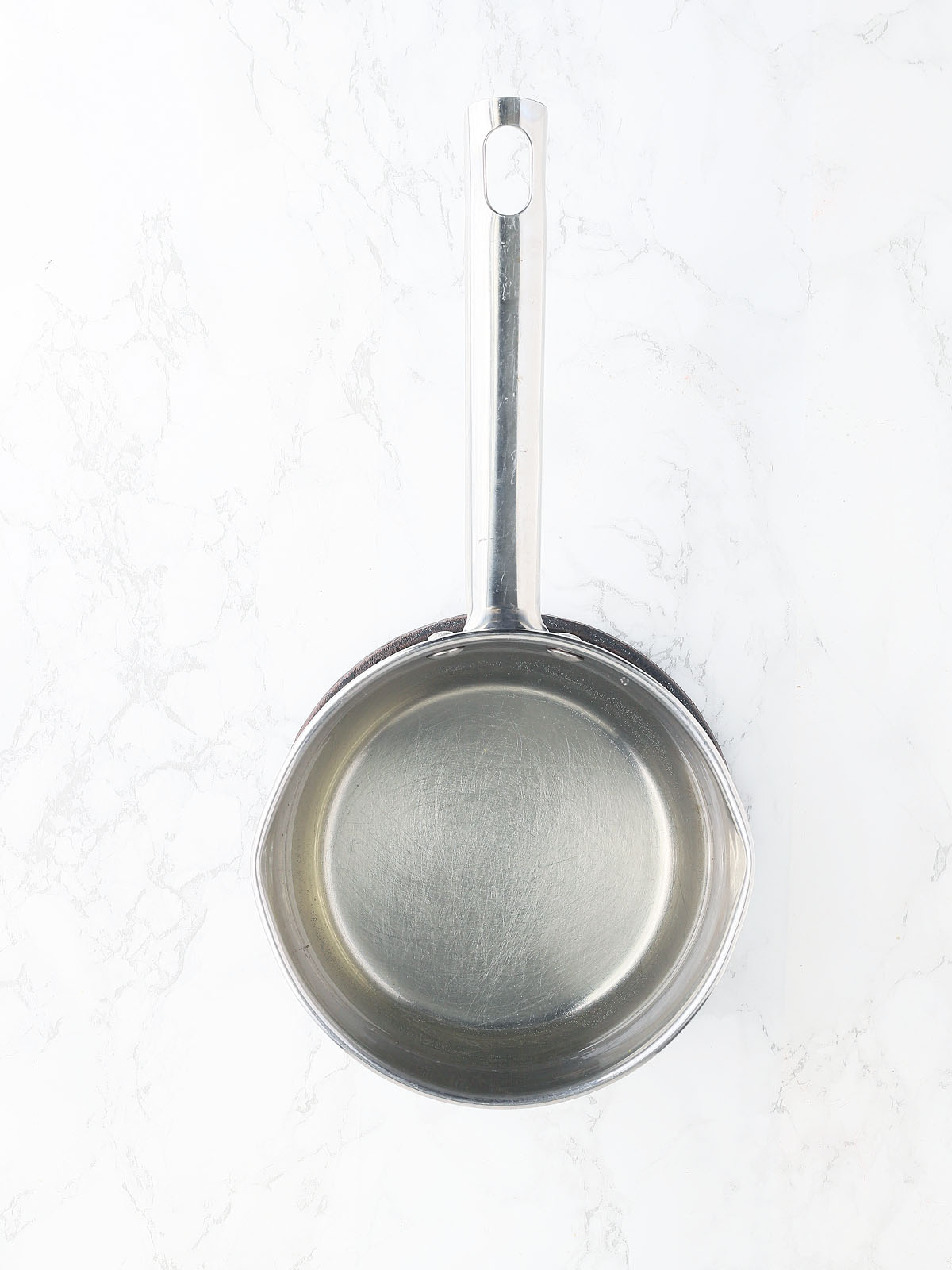 finished simple syrup in a stainless steel saucepan