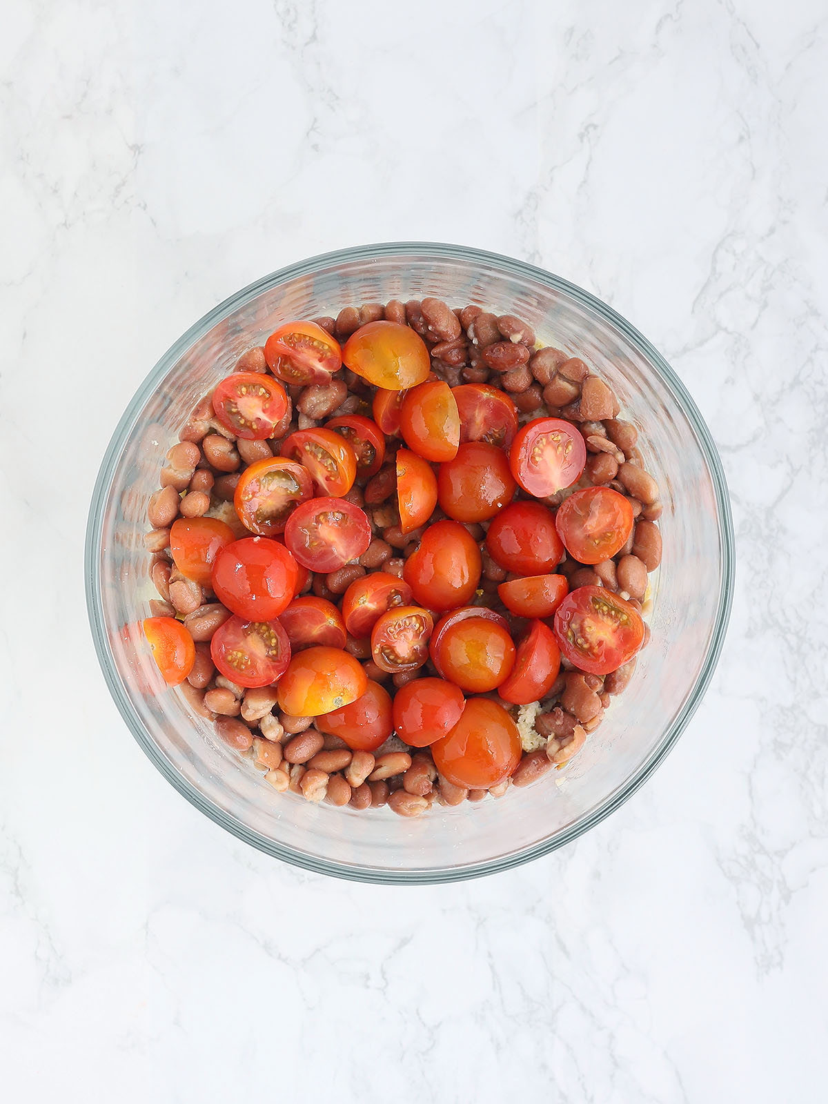 cornbread salad topped with cherry tomatoes