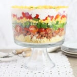 cornbread salad in a clear glass trifle bowl
