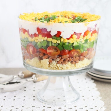 cornbread salad in a clear glass trifle bowl