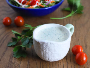 buttermilk ranch dressing in a white gravy boat