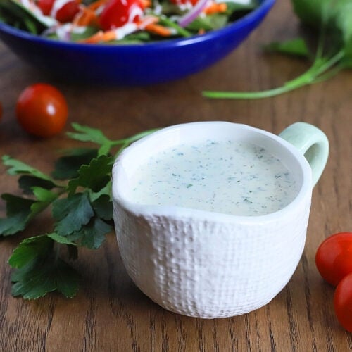 buttermilk ranch dressing in a white gravy boat
