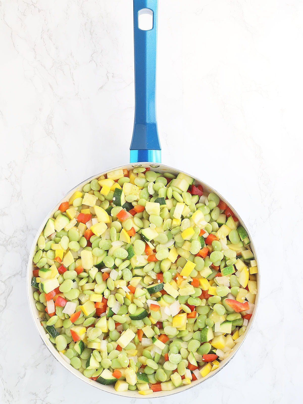 cooked succotash ingredients in a large skillet