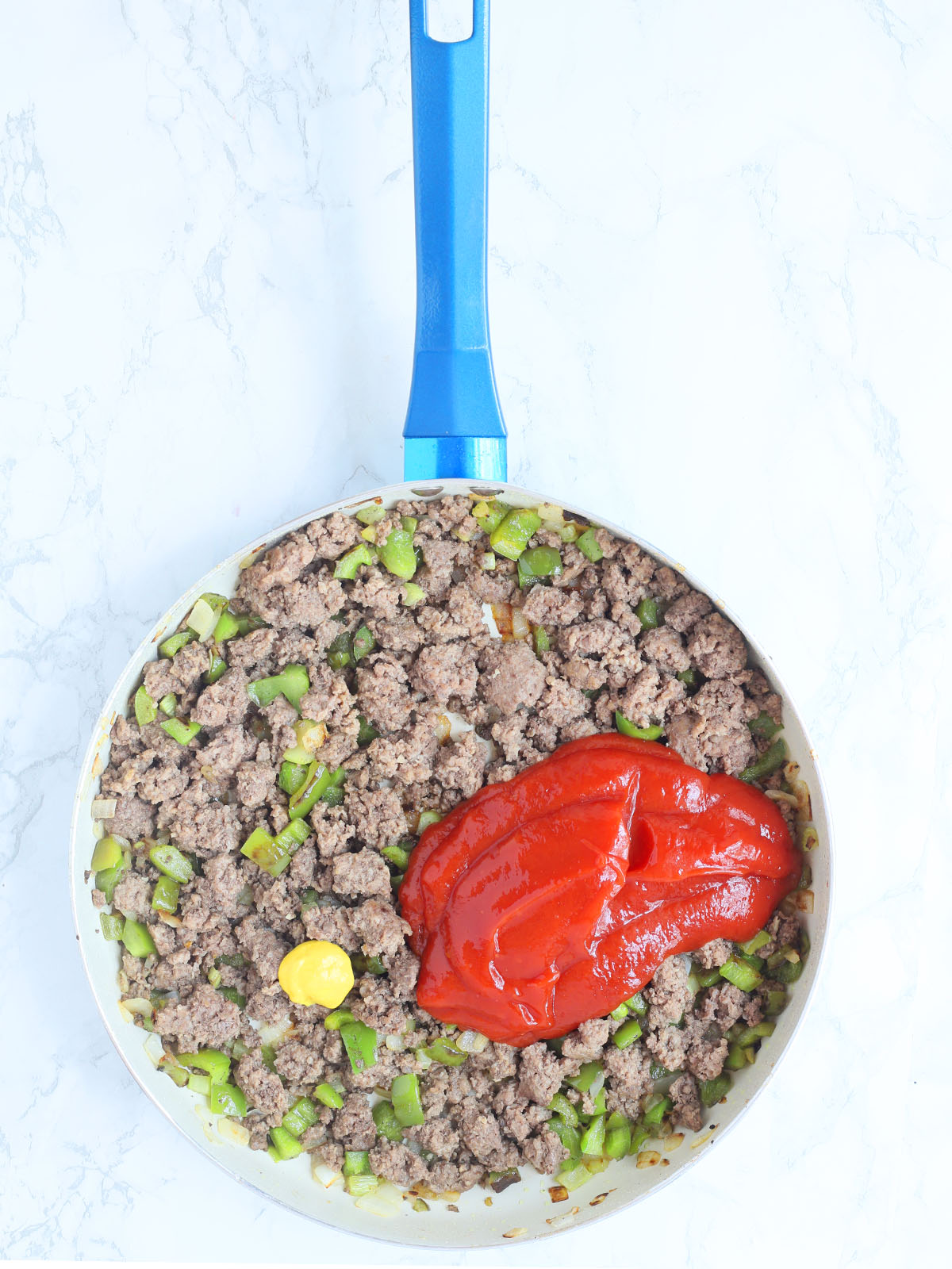 ground beef and vegetables with ketchup, mustard and Worcestershire sauce