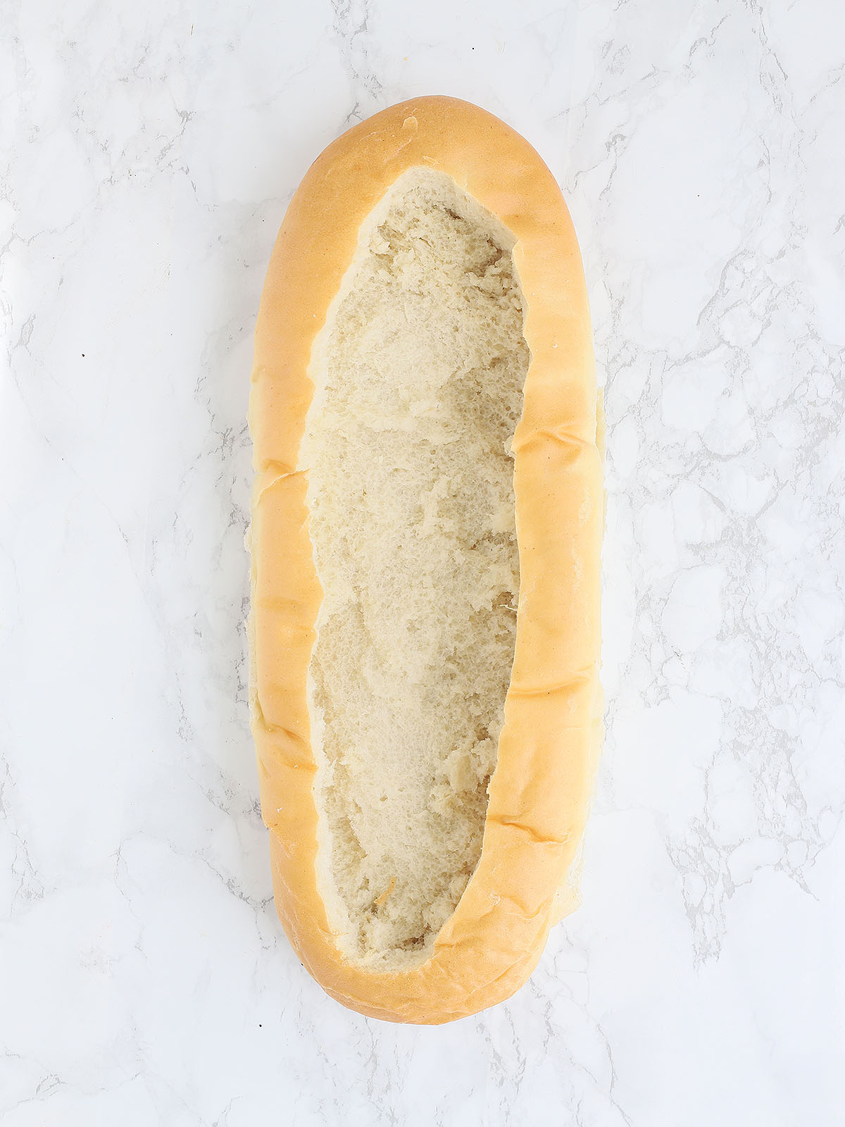 hollowed out loaf of French bread