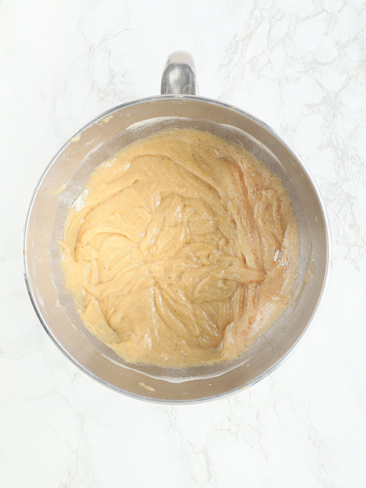 cake batter after flour, baking soda, salt and spices have been mixed in