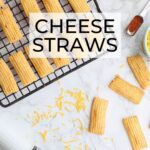 baked cheese straws cooking on a wire rack