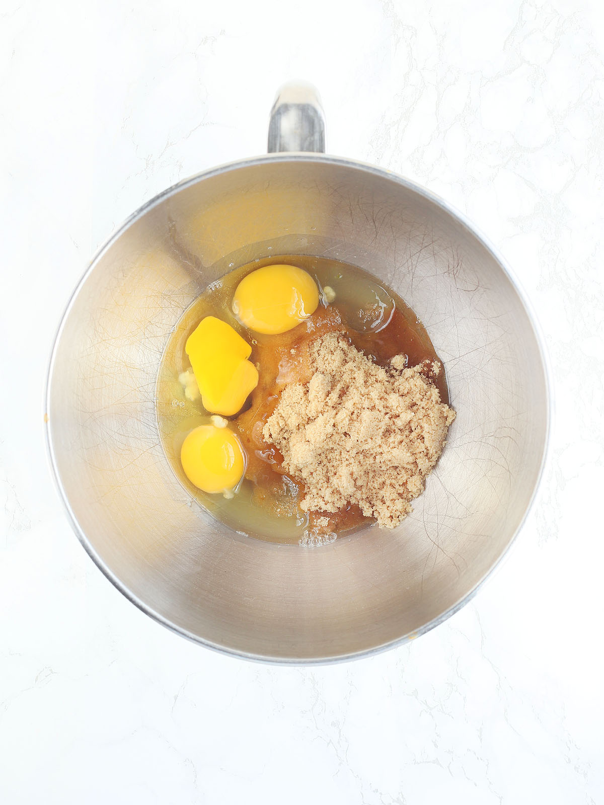 eggs and sugar before they have been whisked together in a mixing bowl