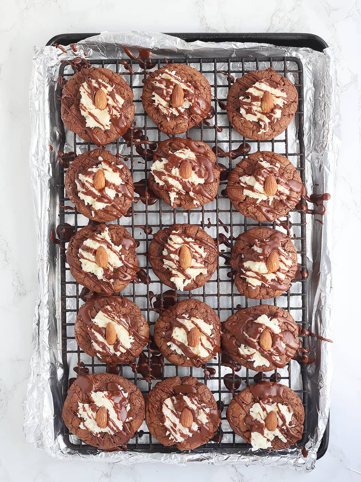almond joy cookies after they have been topped with a toasted almond