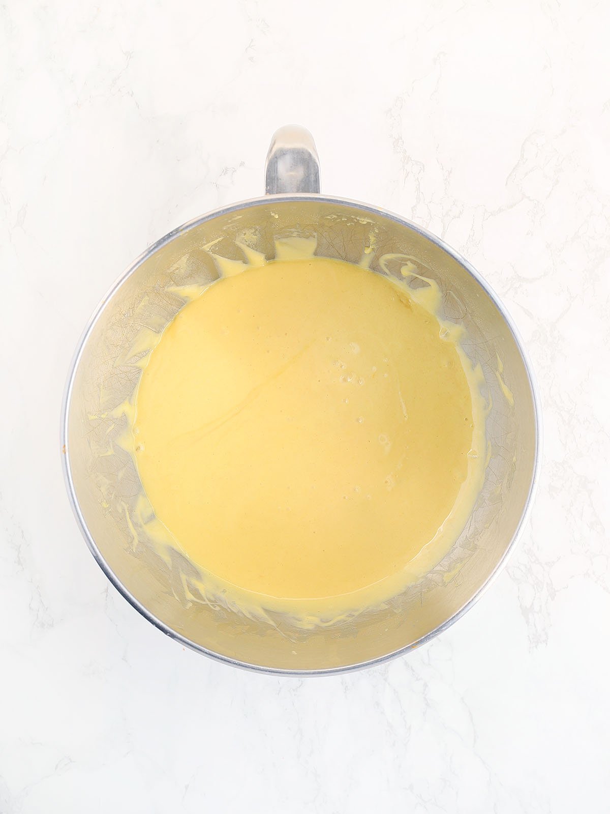 Apricot nectar cake batter after eggs have been added.