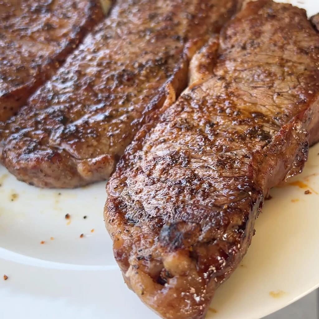 Flavorful steaks resting for 15 minutes.