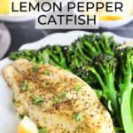 Lemon pepper air fryer catfish fillet on a plate with broccolini and lemon wedges.