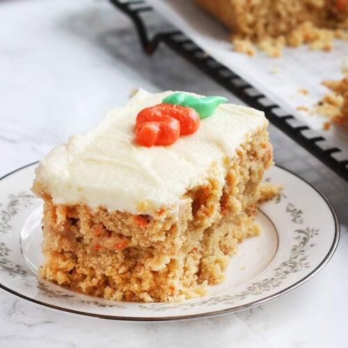 Once slice of pineapple carrot cake on a plate.