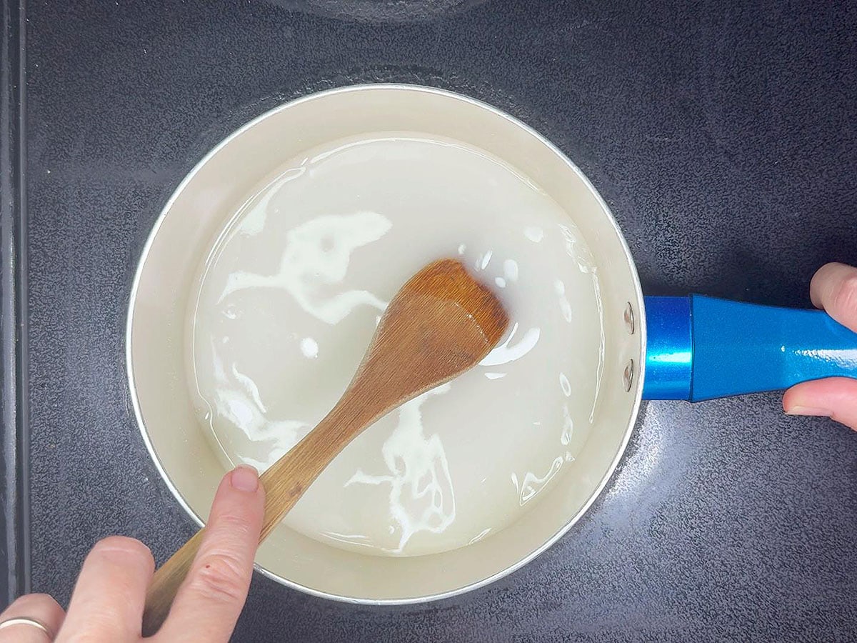 Stirring the sugar, cornstarch and lemon-lime soda in a medium saucepan.