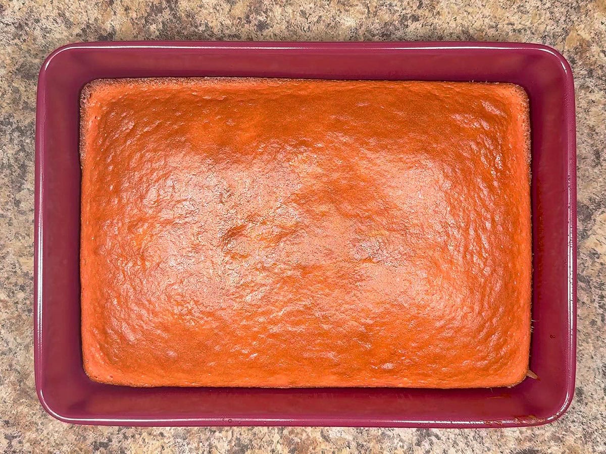 Baked strawberry cake cooling before the icing is applied.