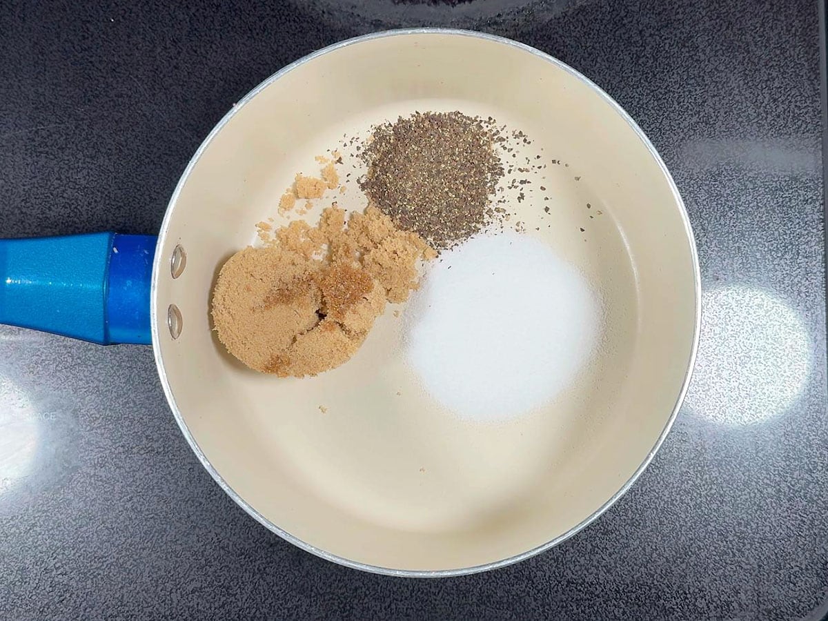 Brown sugar, salt, and ground black pepper in a medium saucepan.