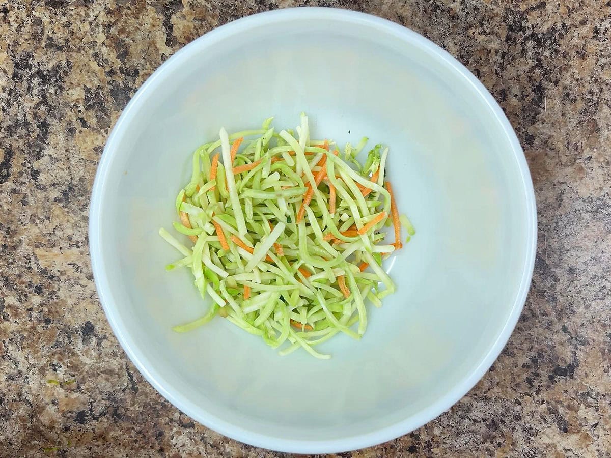 Coleslaw mix in a mixing bowl.