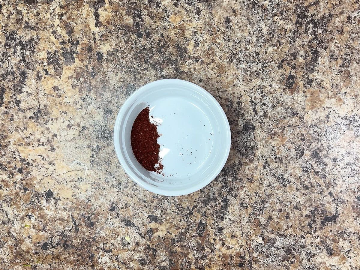 Chili powder in a small bowl.
